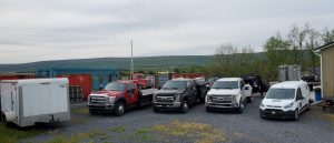 North Road service center work trucks in facility parking lot