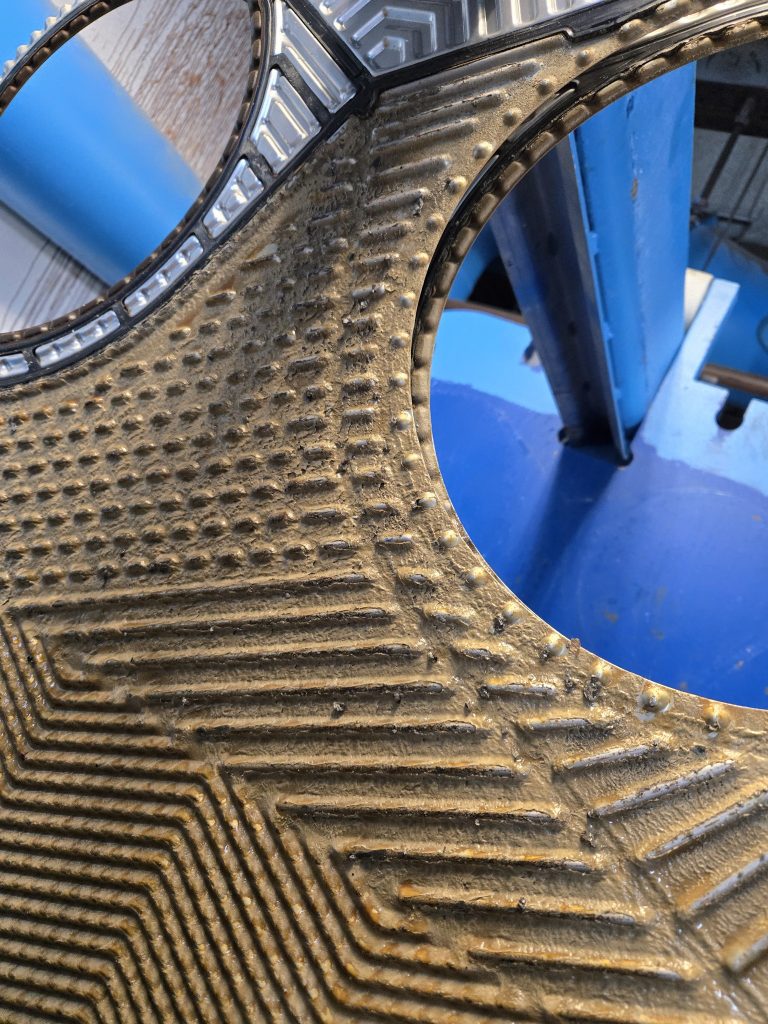 a close up of a metal surface